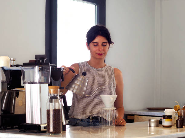 istock woman barista 1227638509