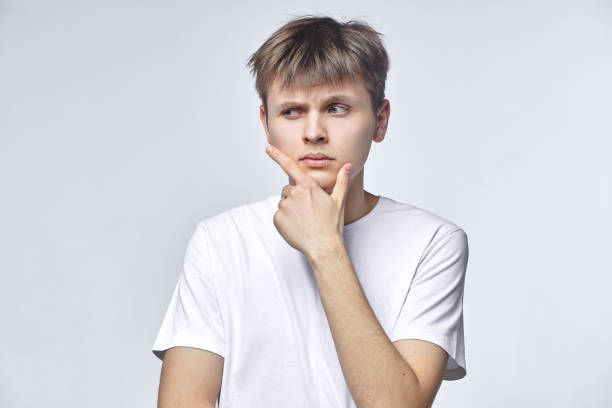 istock The young guy shows various emotions. Talented portrays the inner state and mood. Advertisement concept 1227638777
