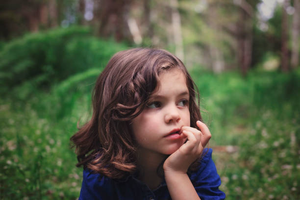 istock Young girl biting her nails 1227642441