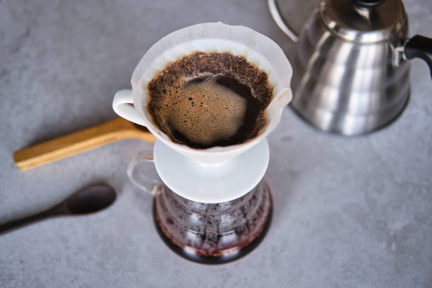 istock Making pour-over coffee with a hario V60 dripper 1227642504