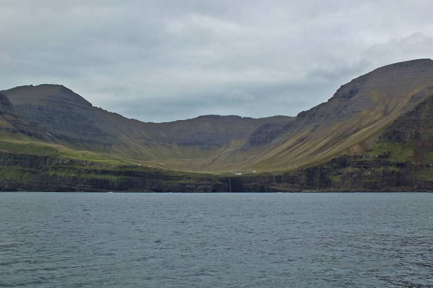 istock Beautiful scenery Mulafossur Waterfall Goose valley and Gasadalur village view from water. Vagar island Faroe islands 1227644607