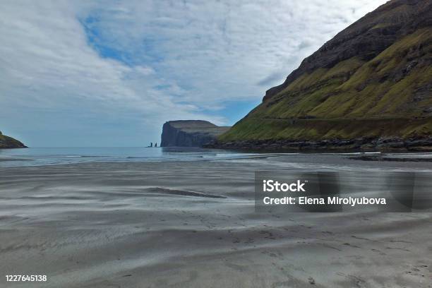 Beautiful Scenery Of The Black Sand Beach And Hills Tjørnuvík Village Streymoy Island Faroe Islands Stock Photo - Download Image Now