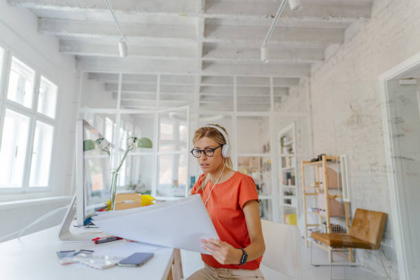 istock Millennial woman working from home 1227647319