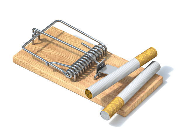 istock Cigarettes in wooden mousetrap 3D 1227647348