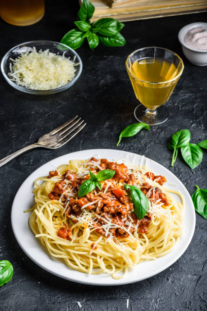 istock Spaghetti with bolognese sauce, parmesan and basil 1227648795