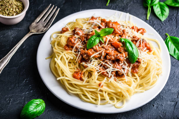 istock Spaghetti with bolognese sauce and parmesan cheese 1227648813
