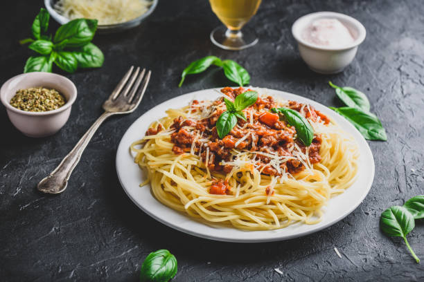 istock Spaghetti with bolognese sauce and parmesan cheese 1227648835