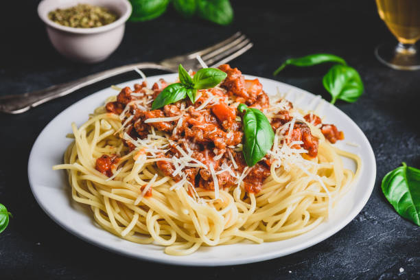 istock Spaghetti with bolognese sauce and parmesan cheese 1227648842