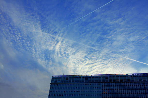 part of building and low clouds in the evening