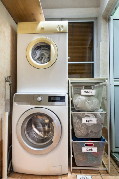 istock Laundry for washing sorted in group of white, light and dark in basket 1227653660