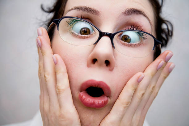 istock Woman in despair with her hands on her cheeks 122767234