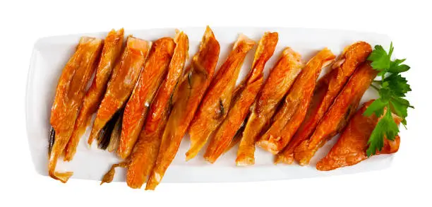 Photo of Smoked salmon belly strips with parsley