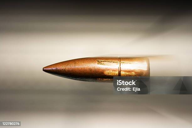 Speeding Bullet Stock Photo - Download Image Now - Bullet, Shooting a Weapon, Gun