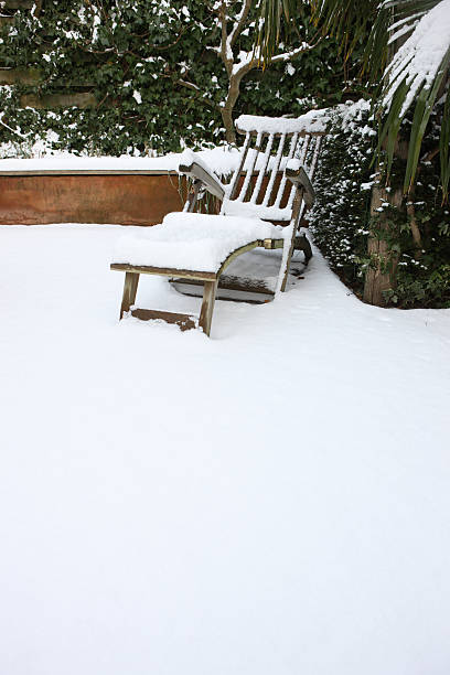 istock Garden Chair In The Snow 122785345