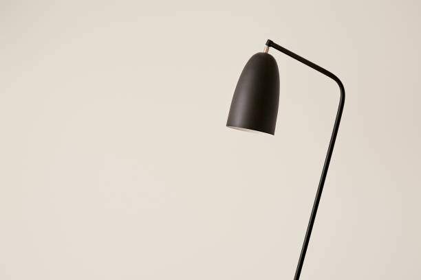 istock black lamp against white wall in apartment 1227854036