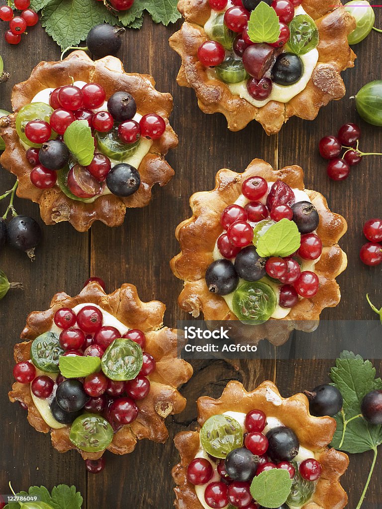 Tartlets Tartlets with lemon cream and fresh berries. Viewed from above. Baked Stock Photo