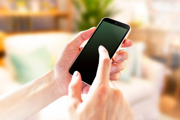 Image of operating a smartphone indoors 5238
