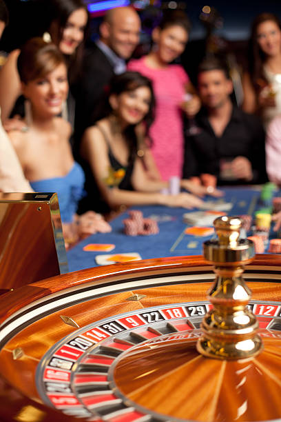 istock group of young people playing roulette 122791228