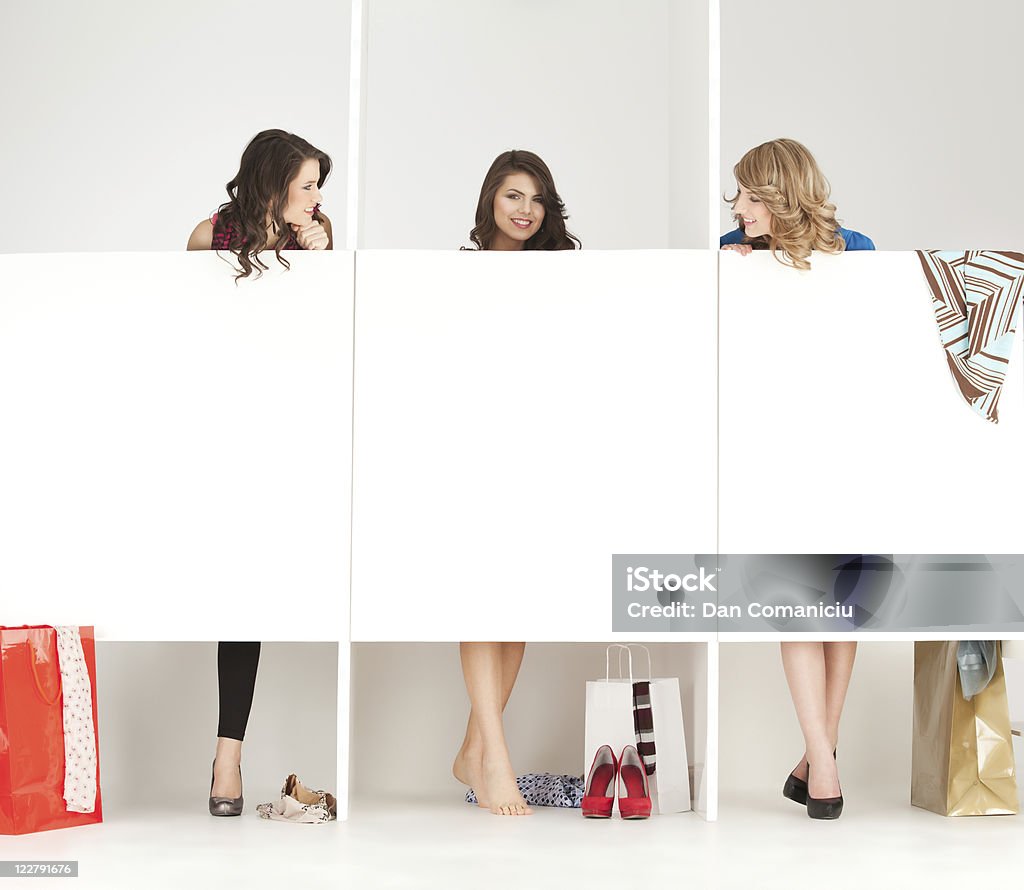 girls looking clothes in wordrobe  Adult Stock Photo