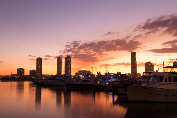 Gold Coast landscape at sunset, Queensland from north of Main Beach, The Spit, as the name implies, extends into the seaway and the landmass consists mostly of public parkland making it a popular location for fishing, boating and relaxing.
