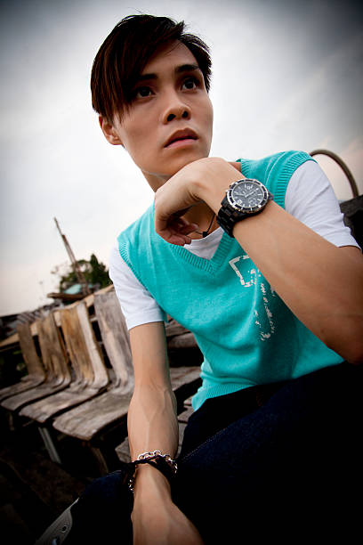 Chinese Teenager in Slum Area stock photo
