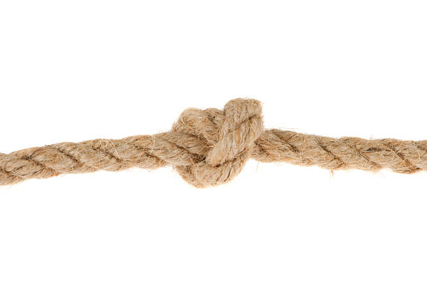 istock Rope with the knot isolated on white 122804867