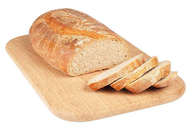 istock Sliced bread on a wooden chopping board 122810720