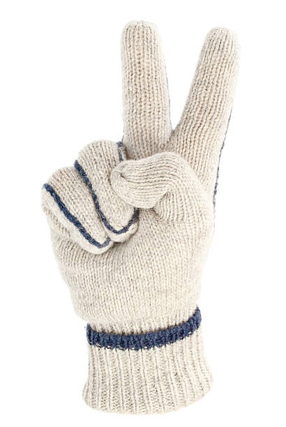 istock Knitted glove with victory or peace sign isolated on white 122812077