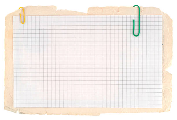 istock Checked notebook paper on the old grungy cardboard background 122813163