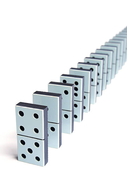 istock Domino pieces in a line on white background 122815550