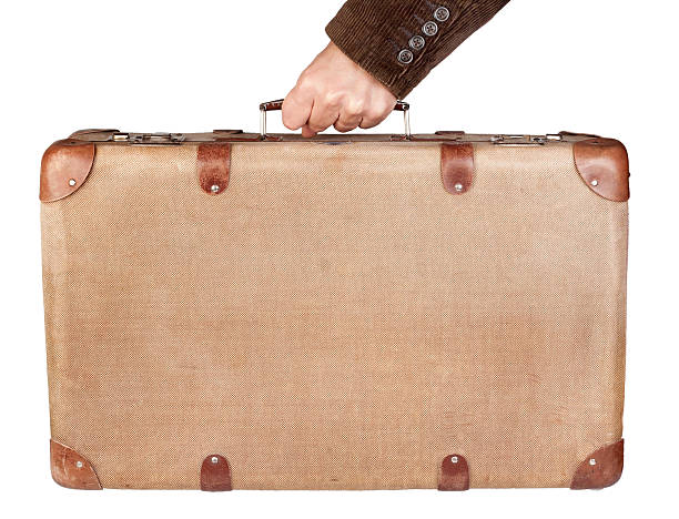 istock Vintage brown suitcase isolated over white background 122816450
