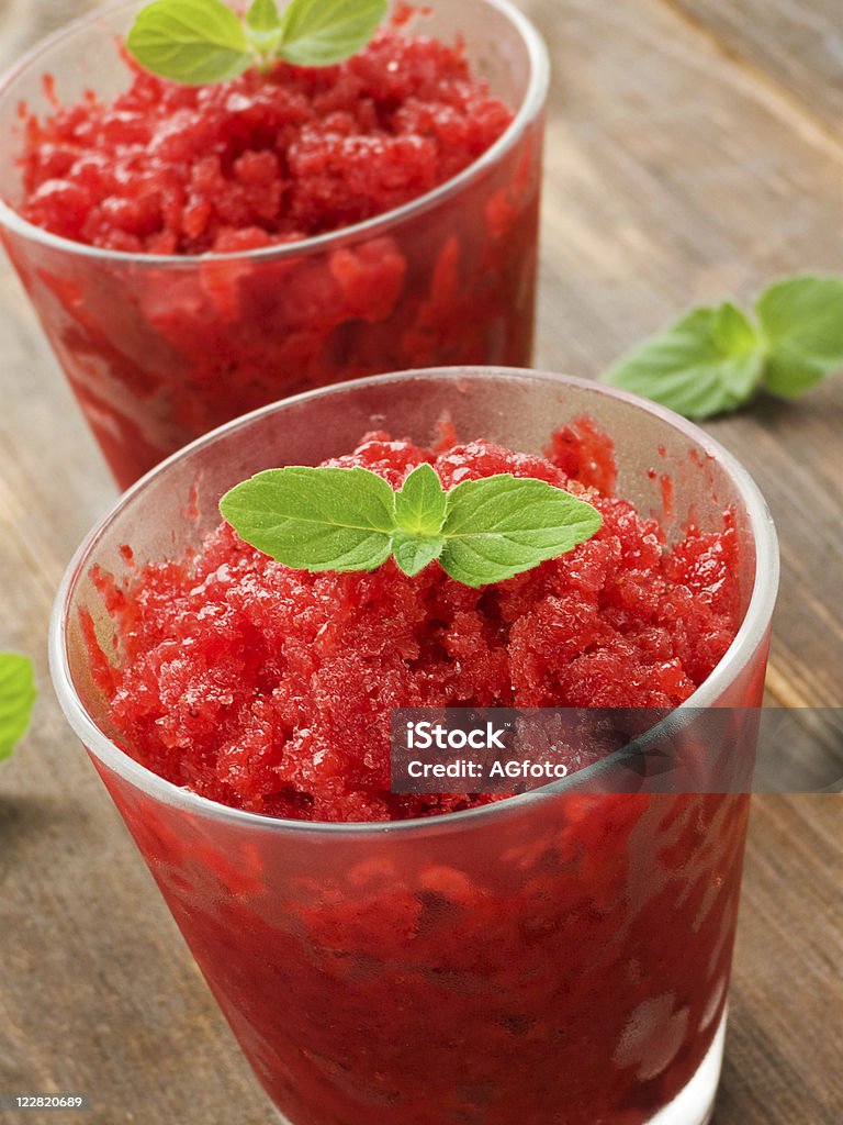 Granita Glasses with fresh strawberry granita and mint. Shallow dof. Berry Fruit Stock Photo