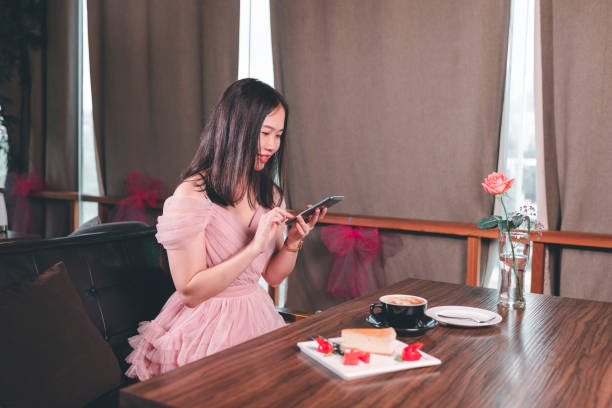istock Girls using cell phones 1228249004