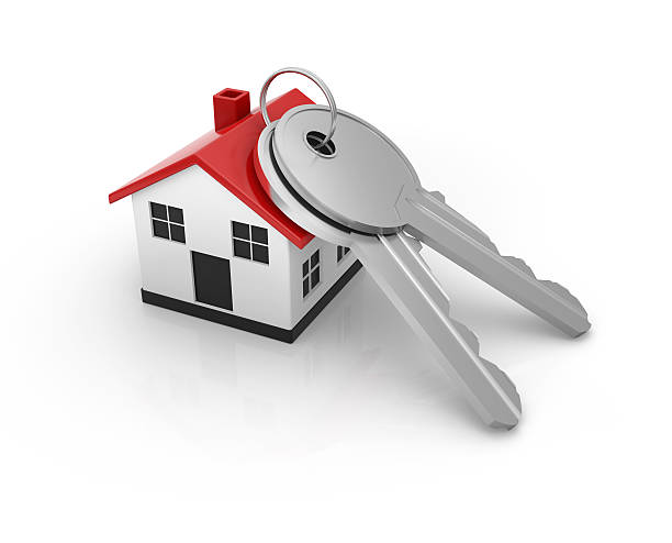 istock Two keys with a house shaped key fob on a white background 122826644