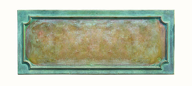 Antique bronze plate on white background Old metal plate framed background texture for the memorial text. Blank antique bronze plate with cracks and scratches on the metal surface, isolated on white background. bronze plaque texture stock pictures, royalty-free photos & images