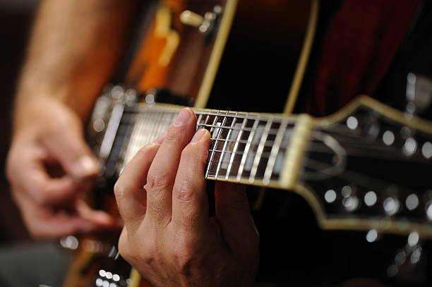 istock Fingers on frets, Guitar 122835390