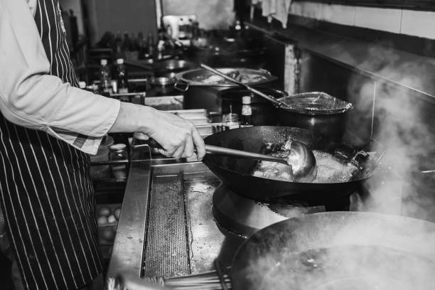 istock Chef stir fry cooking 1228480166