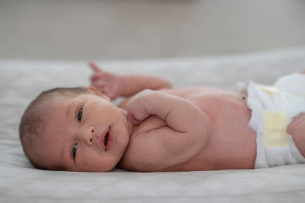 istock Beautiful mixed race baby in diaper 1228577407