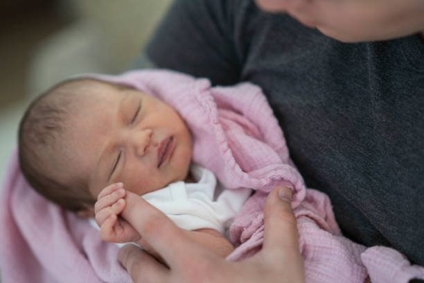 istock New father holding his daughter 1228578889