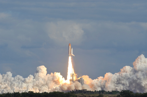 Space Shuttle Atlantis launches from the Kennedy Space Center 