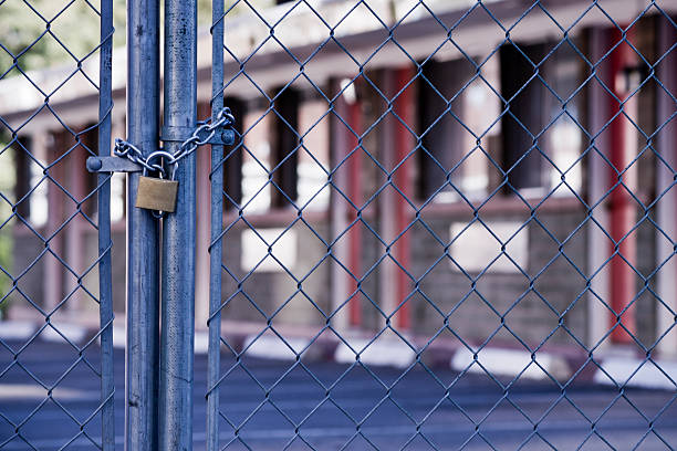A heart-shaped lock on the chain above the lake on the bridge symbolizes a new family.