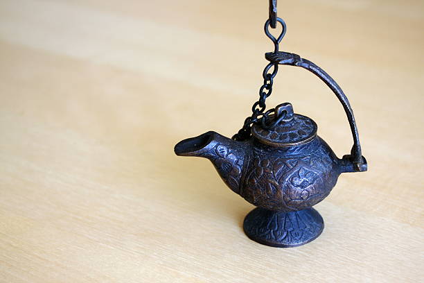 istock Ancient metal oil lamp 122893554