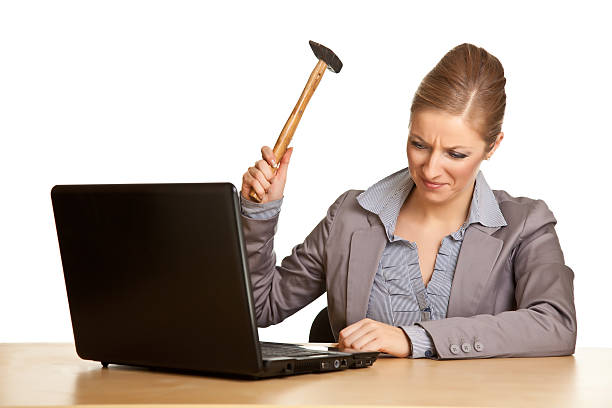 istock Caucasiam woman in formal suit behind desk with notebook 122895280