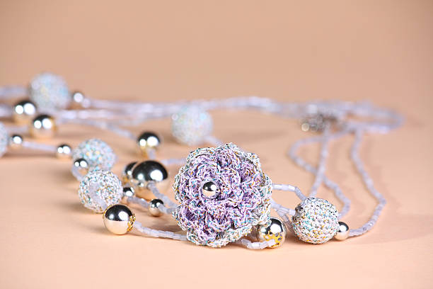 istock Violet beads at pink background 122898723