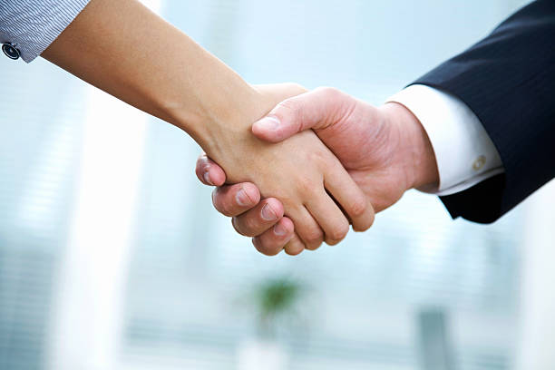 business handshake stock photo