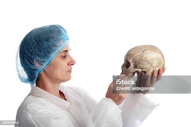 Researcher With Skull Stock Photo - Download Image Now - Adult, Blue, Color Image