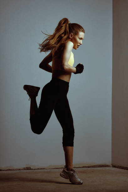 istock Jumping on one leg in the gym 1229254070