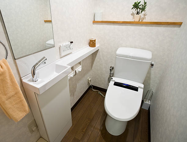 Tiny bathroom Tiny bathroom in Japan japanese toilet stock pictures, royalty-free photos & images