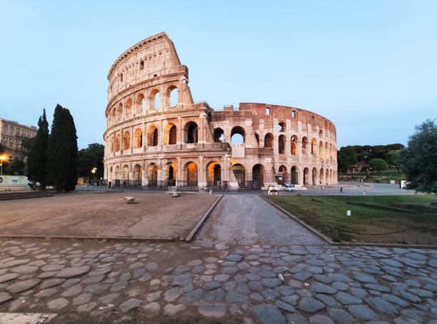 Coliseum in Rome with no people at the sunset stock photo