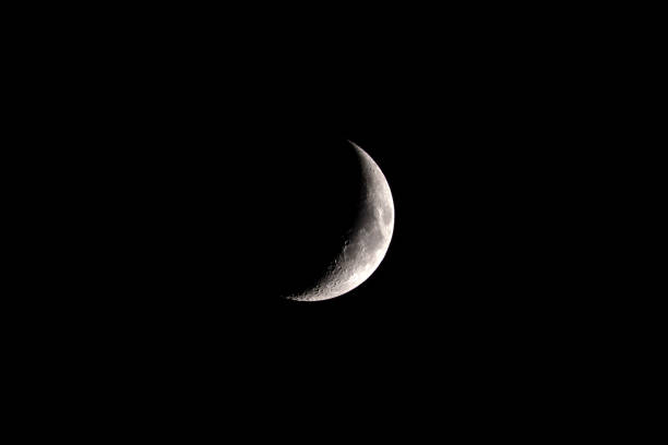 istock Growing phase moon in the dark sky 1229731310
